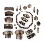 λ A collection of tortoiseshell piqué-work jewels, 19th century, comprising: five haircombs; a