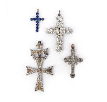 Four cross pendants, including an early 19th century colourless paste cross set in closed-back