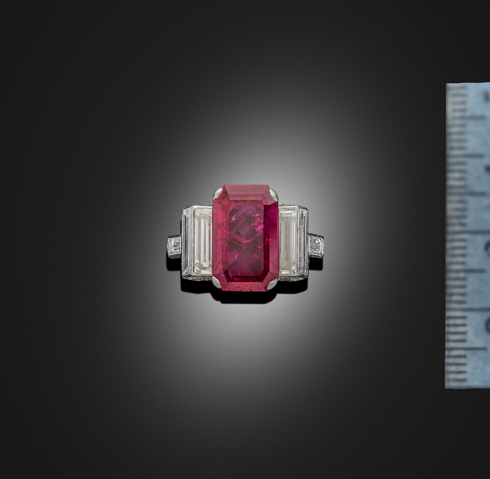 Cartier, an Art Deco ruby and diamond ring, C1935, the emerald-cut ruby measuring 13.04 x 8.10 x 3. - Image 2 of 2