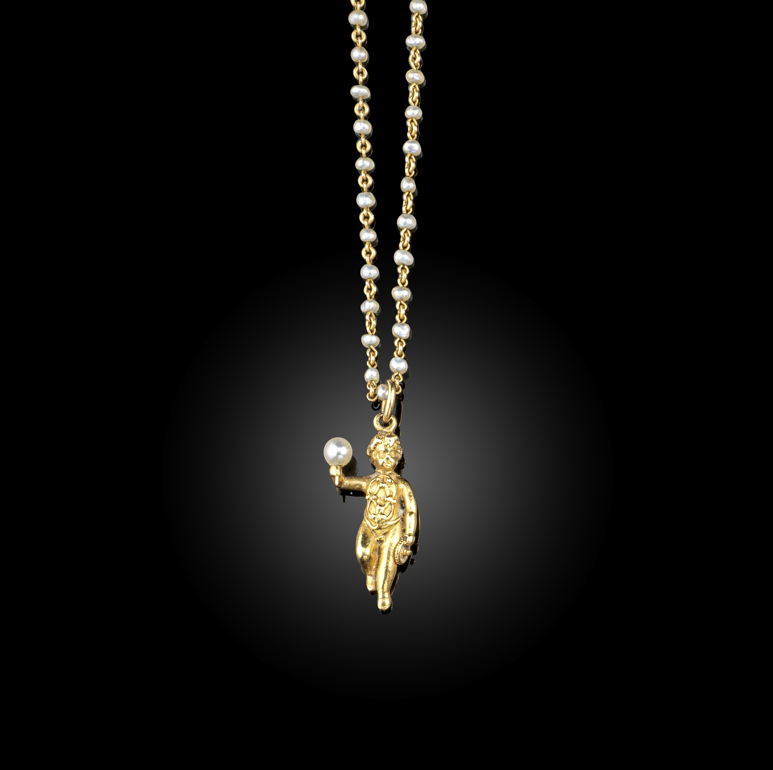 A gold and pearl neckalce, late 19th century, the necklace composed of gold chain linking threaded