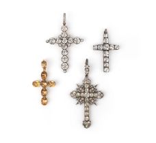 A collection of four gold cross pendants, 19th and 20th century; comprising: a cross pendant set