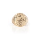 A gold signet ring, the large gold signet ring engraved with the crest of clan Wallace, the garter