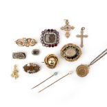 A mixed group of jewellery, including a George III garnet and seed pearl gold mourning brooch, a