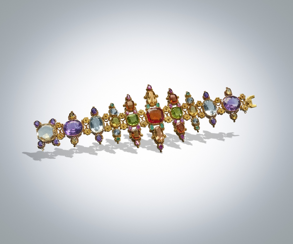 A fine gold and gem-set bracelet, 1830s, composed of graduated vertical bar-shaped links set with