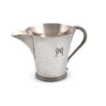 By H. G Murphy, a silver cream jug,London 1935, also marked with the Falcon mark,tapering circular