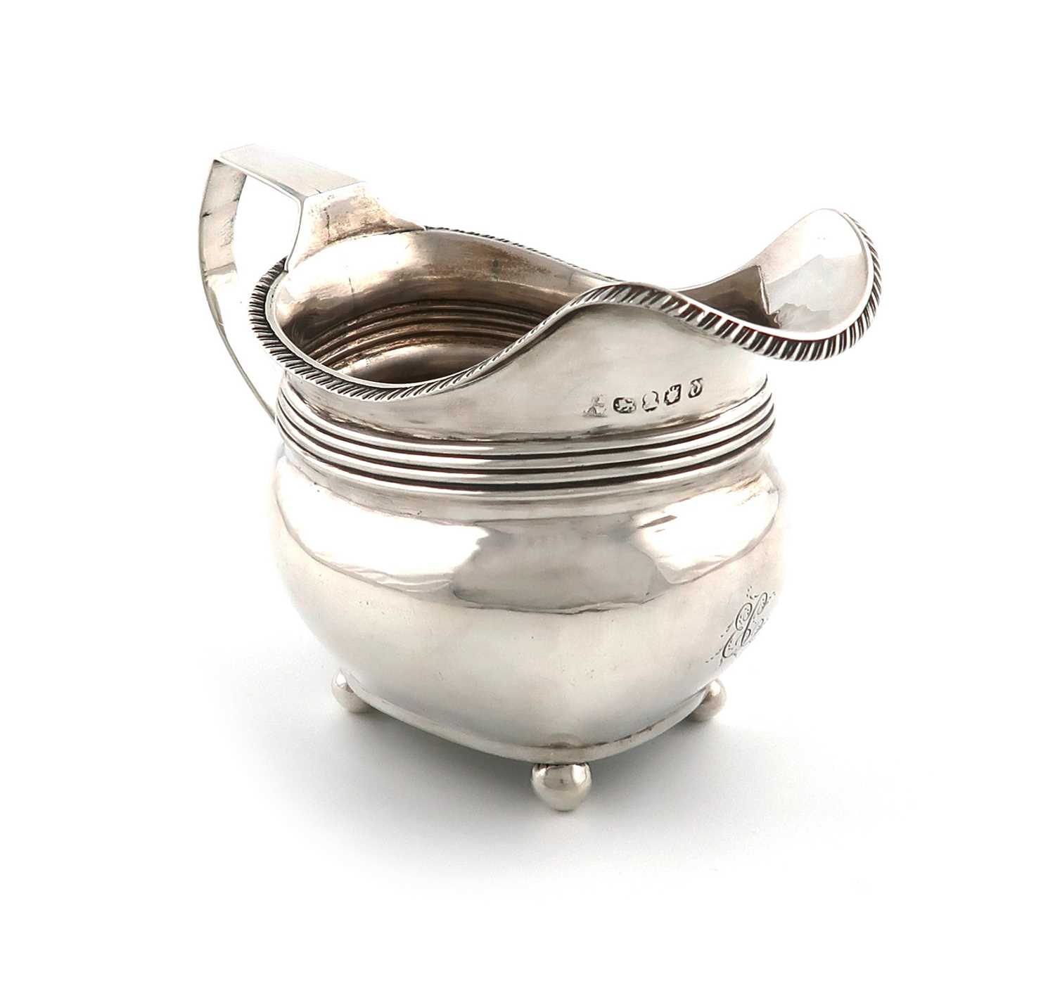 A George III provincial silver cream jug,maker's mark worn, probably for James Barber & William