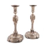 A pair of George III old Sheffield plated candlesticks,unmarked, by Boulton and Fothergill, circa