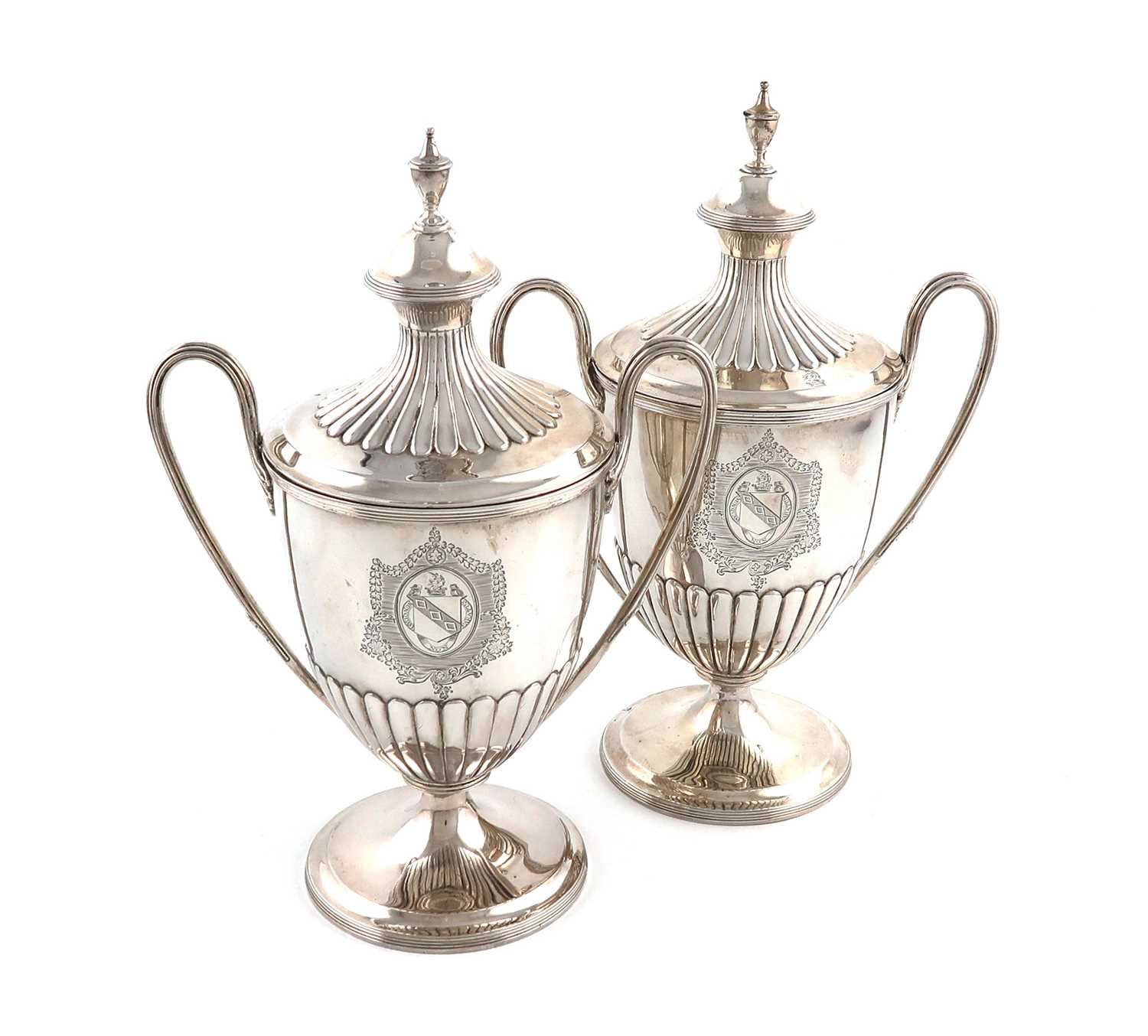 A pair of George III silver two-handled cups and covers,by Henry Chawner, London 1795,vase form,