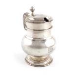A Victorian silver mustard pot,by Charles and George Fox, London 1856,modelled as a 17th-century