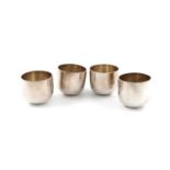 A set of four modern silver tumbler cups,maker's mark of R. Comyns, Birmingham Assay Office,