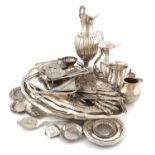 A mixed lot,comprising Spanish silver items: a ewer of fluted ovoid form, leaf capped scroll handle,