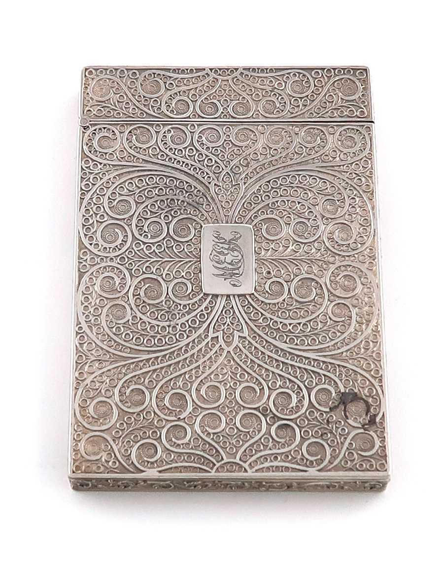 A William IV silver card case,by Taylor and Perry, Birmingham 1832,rectangular form, simulated