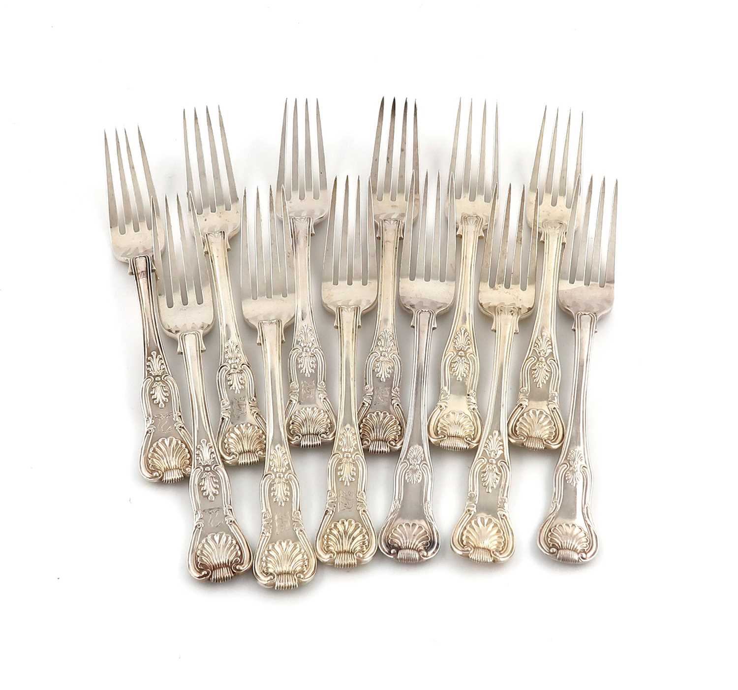 A matched set of twelve 19th century silver King's pattern table forks,various dates and makers,some