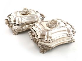 A pair of early 19th century old Sheffield plated entrée dishes, covers and warming bases,