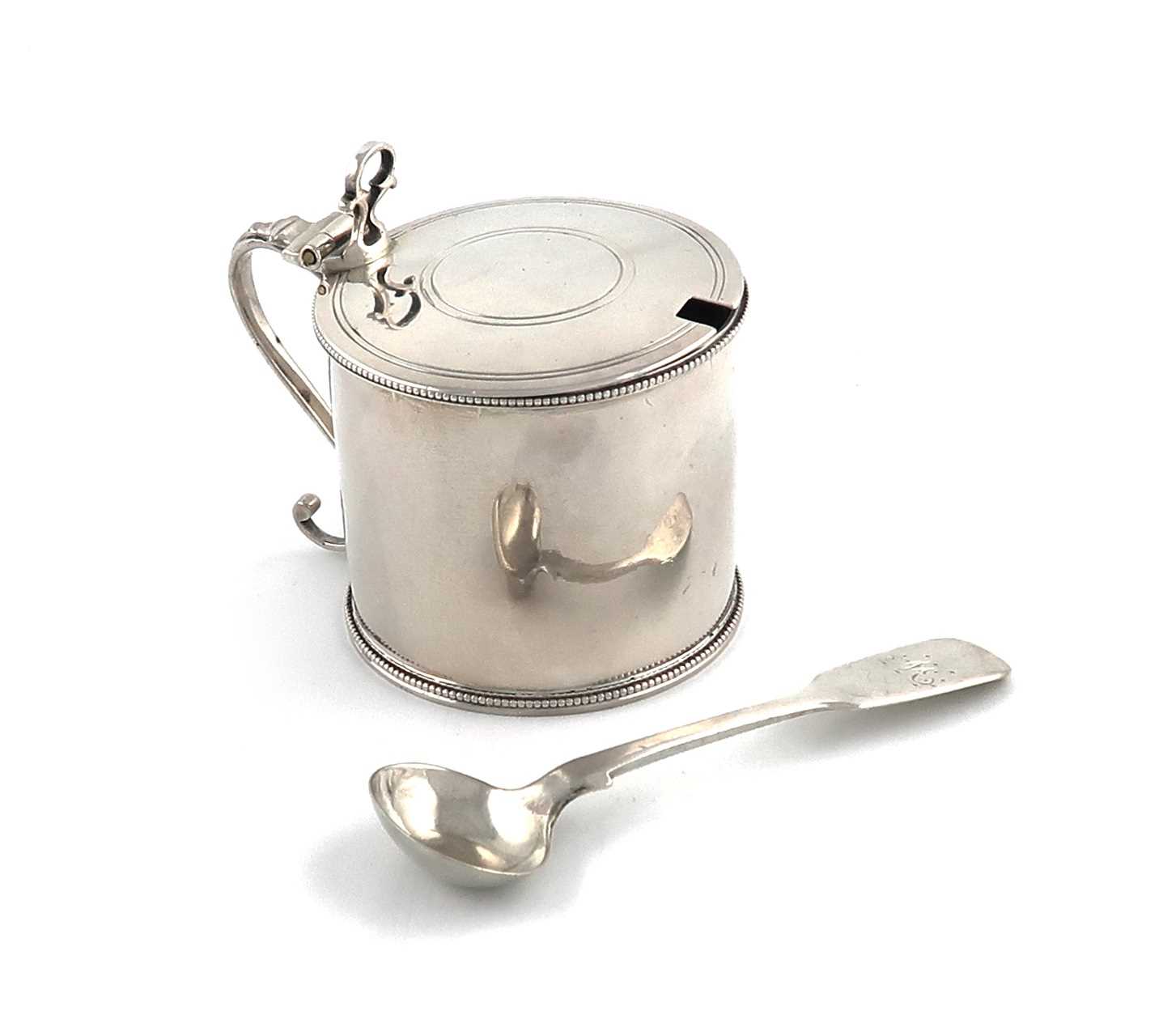 A George III silver mustard pot,maker's mark possibly that of Hester Bateman, over-struck with