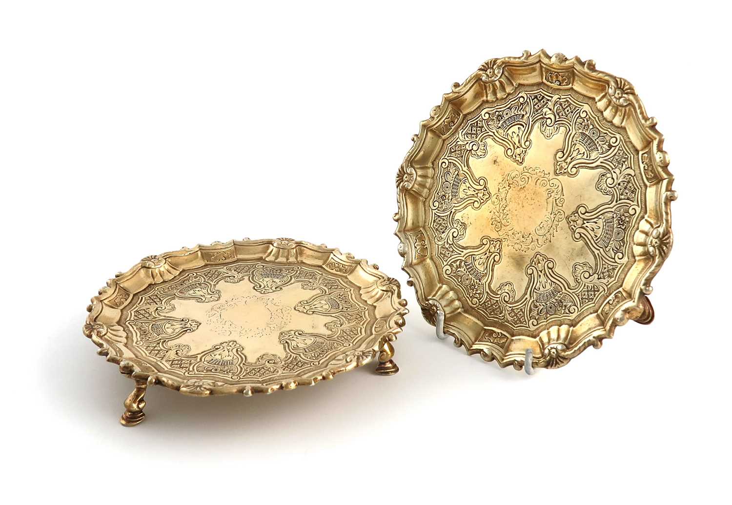 A pair of George II Irish silver-gilt waiters,by William Townsend, Dublin circa 1745,circular