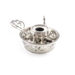 A Victorian silver chamberstick,by William Moulson, London 1848,circular form, raised pierced