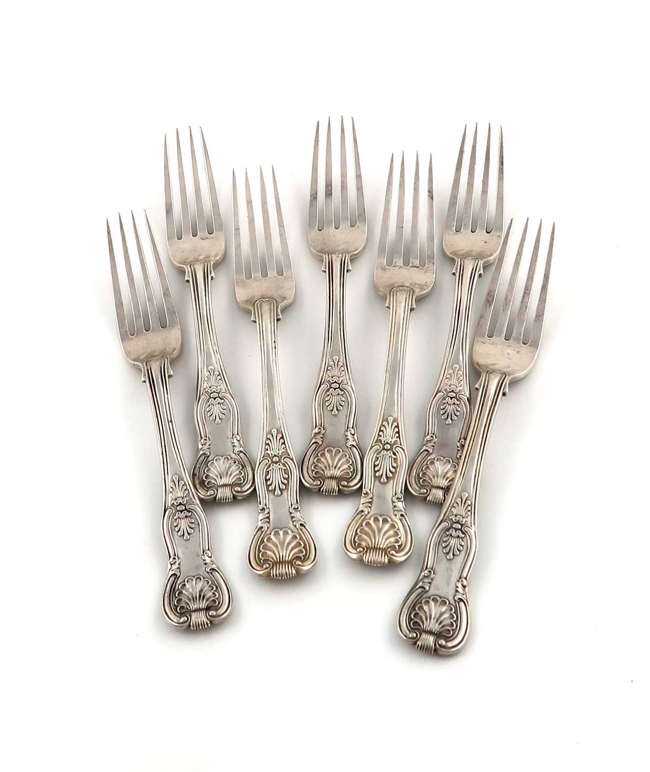 A matched set of seven Victorian silver King's pattern dessert forks,two by George Adams, London