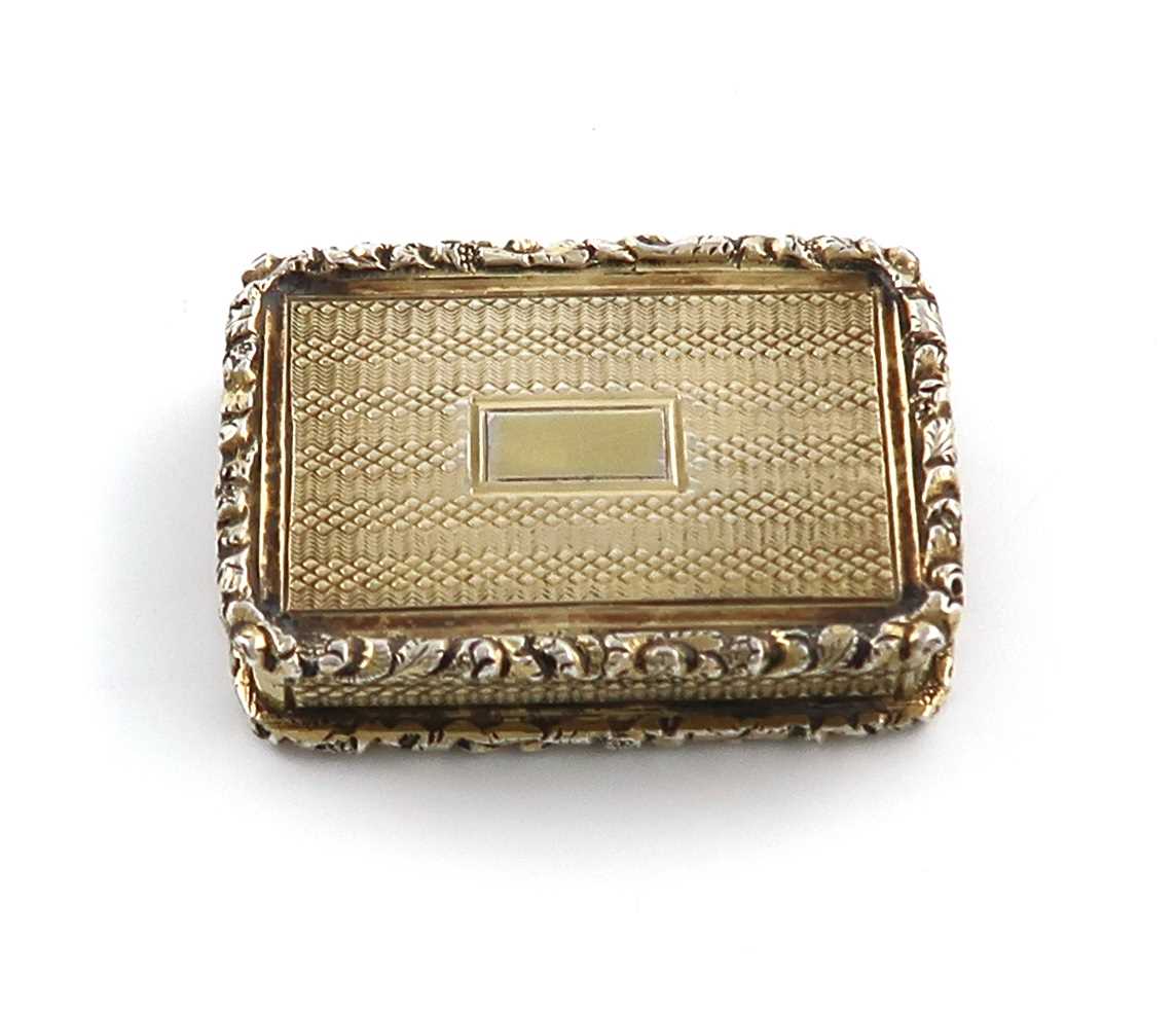 A George IV silver-gilt vinaigrette,by Vale and Wheeler, Birmingham 1829,rectangular form, engine-