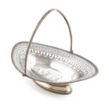 A George III silver swing-handled basket,no apparent maker's mark, London 1786,oval form, pierced
