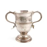 A George III silver two-handled racing cup,by Stephen Adams, London 1800,circular form, scroll