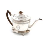 A George III silver teapot and stand, by John Emes, London 1799,oval form, engraved foliate