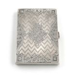 A Victorian silver card case,by Hilliard and Thomason, Birmingham 1877,rectangular form, engine-