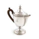 A George III silver argyle,by Henry Green, London 1797,urn form, scroll handle, the hinged cover