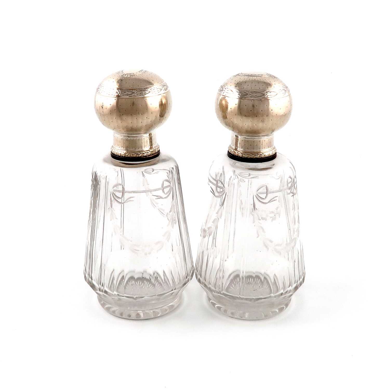 A large pair of French silver-mounted glass scent bottles,maker's mark of J.G in a lozenge,