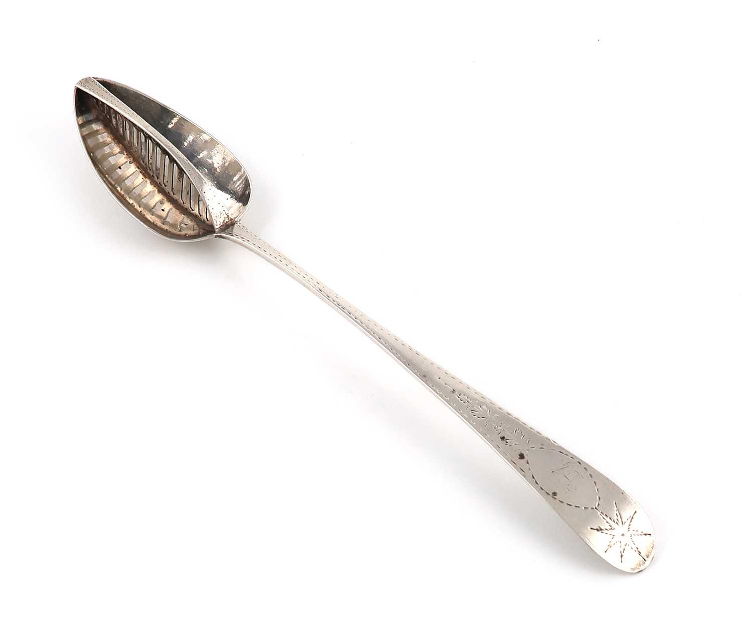 A George III Irish silver Bright-cut straining spoon,maker's mark of JS, Dublin 1800,the terminal