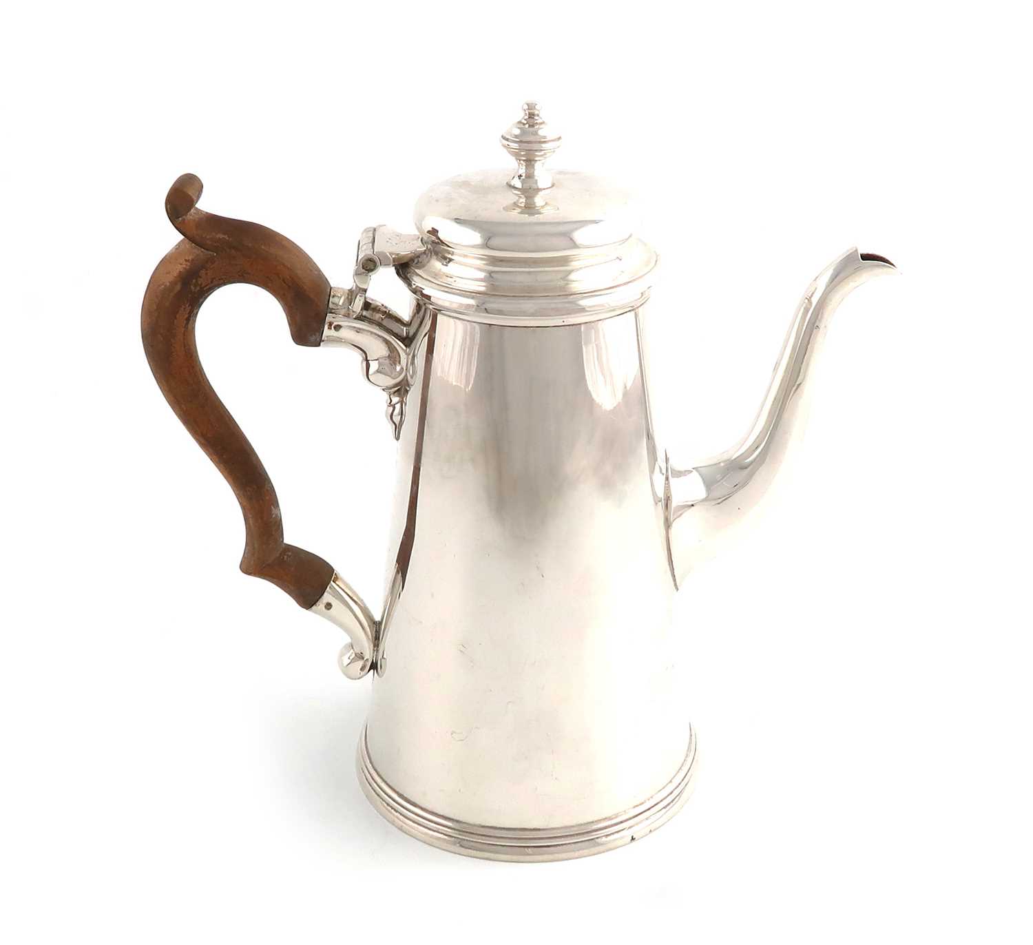 A modern silver coffee pot,by Nayler Brothers, London 1965,in the early 1tth century manner,