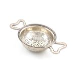 A Victorian silver two-handled strainer,by Rawlings and Summers, London1849,circular form, reeded