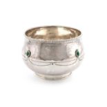 By A. E. Jones, an Edwardian Arts and Crafts silver bowl,Birmingham 1906,circular form, spot-