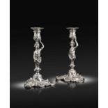 A pair of George II silver caryatid candlesticks, by Henry Hayens, London 1751,caryatid stems, urn-