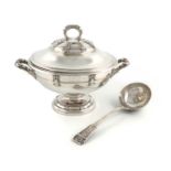 A two-handled small silver soup tureen and cover with a soup ladle,by The Goldsmiths and