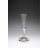 An ale glass with a mixed twist stem, c.1760-70, the drawn trumpet bowl rising from a stem with a