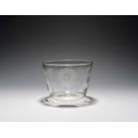 A Jacobite glass finger bowl, c.1760, the rounded body engraved with an eight-petalled rose and