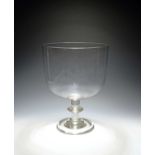 A massive ceremonial goblet or mixing glass, c.1790-1800, the deep U-shaped bowl raised on a knopped