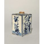 A Delft tea canister, 18th/19th century, the square form painted in a deep blue with figures and