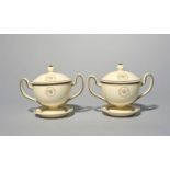 A pair of Wedgwood creamware chocolate cups with covers and stands, late 18th century, the two-