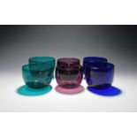 Three pairs of coloured glass finger bowls, c.1800, of rounded U-shape, in cobalt blue, emerald