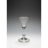 A balustroid wine glass, c.1730-40, the bell bowl with a solid base, raised on a plain stem with