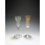 Two ale glasses, c.1750-70, one with a round funnel bowl engraved with hops and barley, raised on