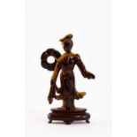 A CHINESE TIGER'S EYE FIGURE OF MAGUQING DYNASTYStanding, wearing long flowing robes, with a