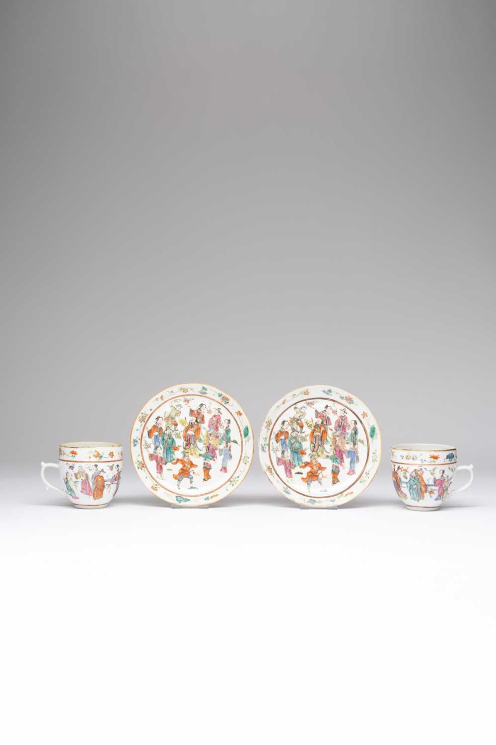 A PAIR OF CHINESE FAMILLE ROSE TEA CUPS AND SAUCERSSIX CHARACTER TONGZHI MARKS AND OF THE PERIOD