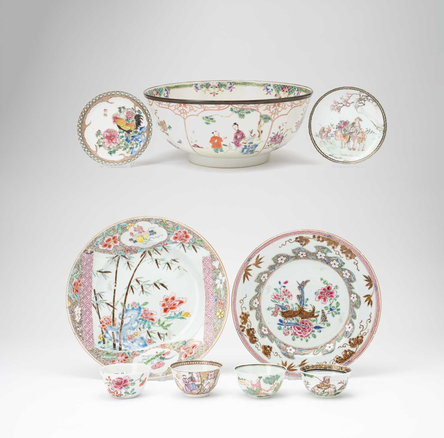 A GROUP OF NINE CHINESE FAMILLE ROSE ITEMS18TH CENTURYComprising: a bowl with a metal rim, two