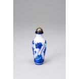 A CHINESE SAPPHIRE-BLUE OVERLAY GLASS ‘LOTUS’ SNUFF BOTTLEQIANLONG 1736-95Attributed to the Imperial