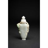 A CHINESE JADEITE VASE AND COVERLATE QING DYNASTY/ REPUBLIC PERIODThe flattened body carved with a