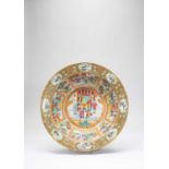 A LARGE CHINESE CANTON FAMILLE ROSE BASIN19TH CENTURYDecorated with panels of flowers, and with