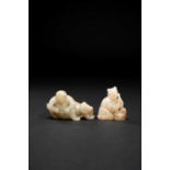 TWO SMALL CHINESE JADE CARVINGSQING DYNASTY OR LATERBoth depicting seated figures beside mythical